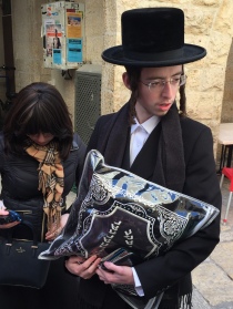 Met this young Orthodox Jew and his wife on their way to the wall, he was so kind and answered our questions. We asked if he was wearing a yarmulke under his hat…..he took of his hat to show he was and the more he wore on his head, the closer it brought him to God ; )