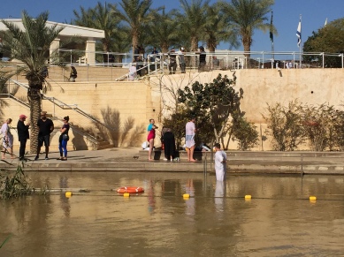Interesting picture, there is a division for the Jordan side and Israel side. Same water on both sides (murky and brown) but people were going in on the Israel side