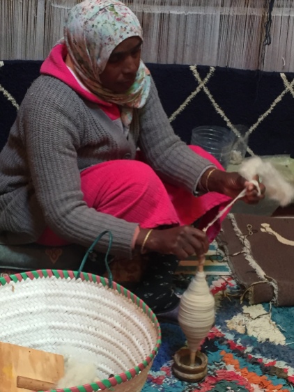 spinning wool into thread